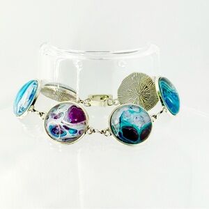 Artistic Silver Bracelet with Blue and Purple Accents